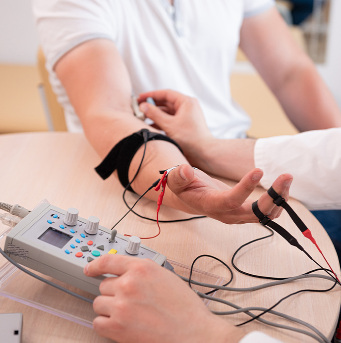 Doctor at SF Bay Peripheral Neuropathy evaluating a patient for neuropathy